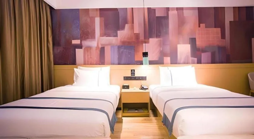 Bed in City Comfort Inn Dongfang Donghai Road Gymnasium Municipal Government