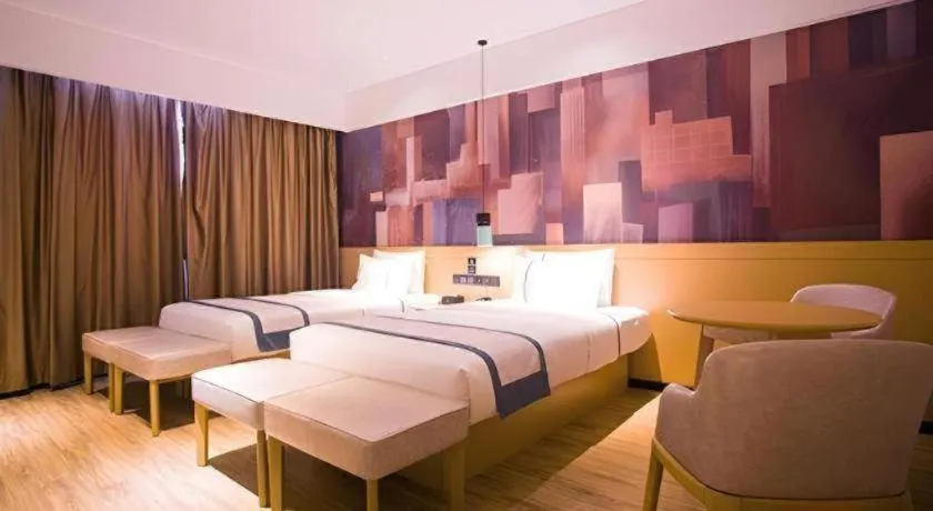 Bed in City Comfort Inn Dongfang Donghai Road Gymnasium Municipal Government