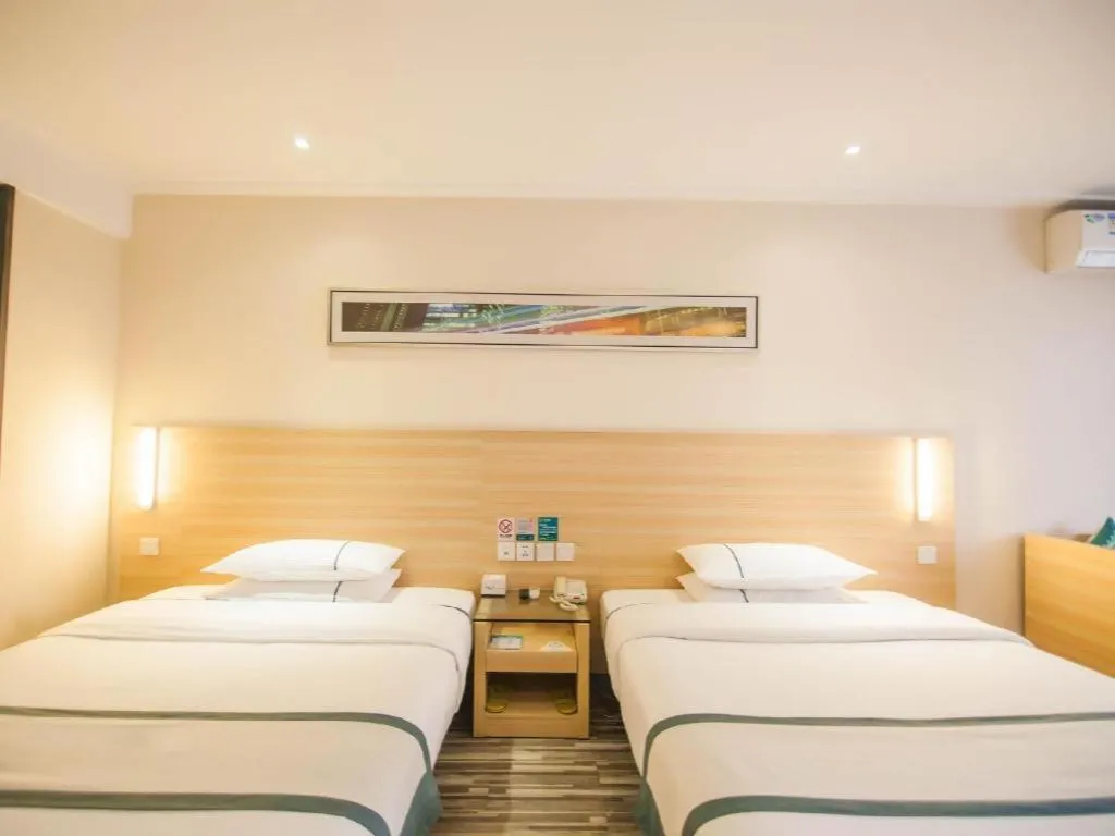 Bed in City Comfort Inn Yichang Dongshan Three Gorges University Shuiyuecheng