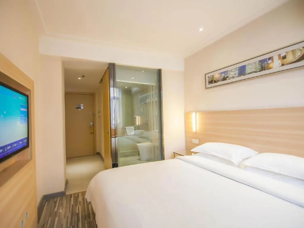 Bed in City Comfort Inn Yichang Dongshan Three Gorges University Shuiyuecheng