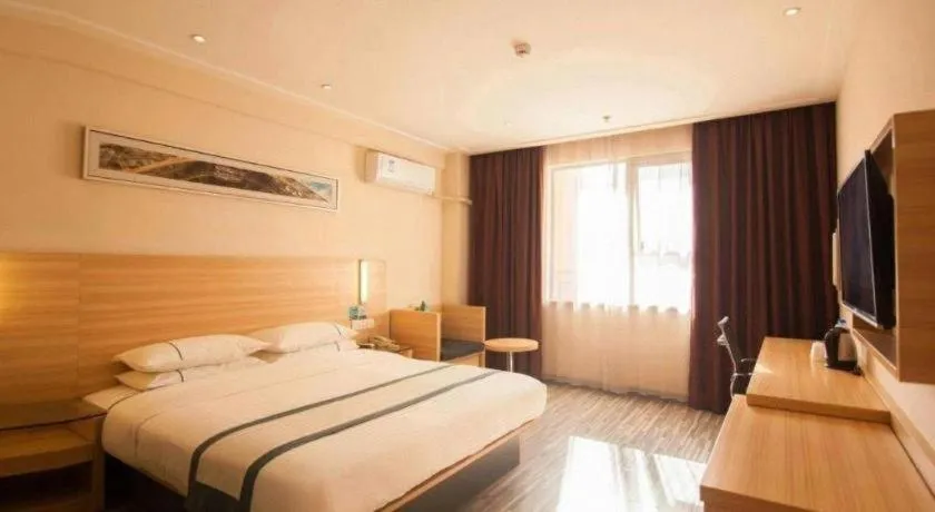 Bed in City Comfort Inn Yichang Dongshan Three Gorges University Shuiyuecheng