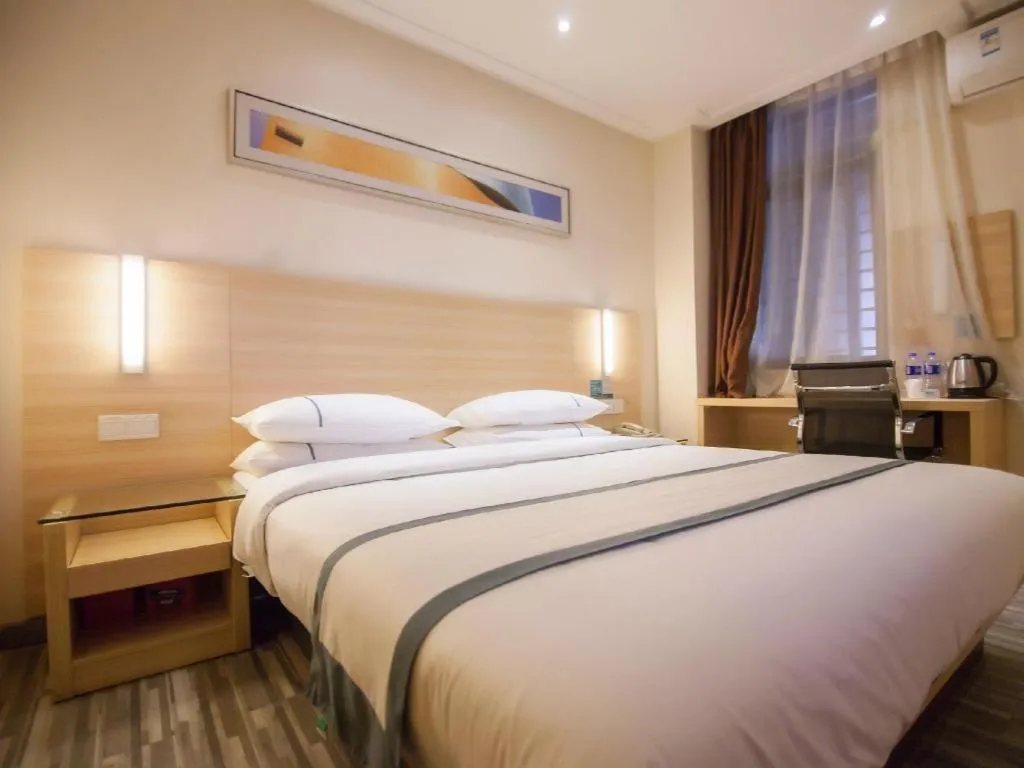 Bed in City Comfort Inn Yichang Dongshan Three Gorges University Shuiyuecheng