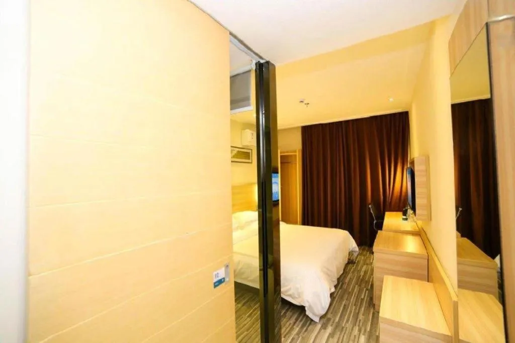 Bed in City Comfort Inn Yichang Dongshan Three Gorges University Shuiyuecheng