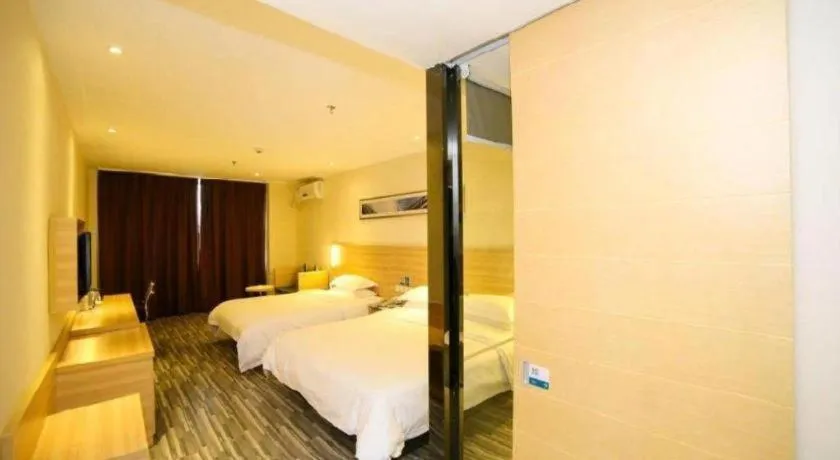 Bed in City Comfort Inn Yichang Dongshan Three Gorges University Shuiyuecheng
