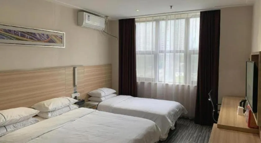 Bed in City Comfort Inn Yichang Dongshan Three Gorges University Shuiyuecheng