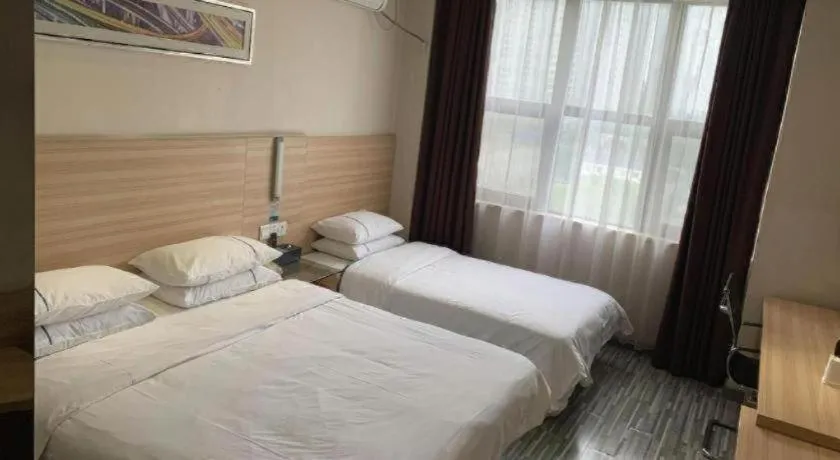 Bed in City Comfort Inn Yichang Dongshan Three Gorges University Shuiyuecheng