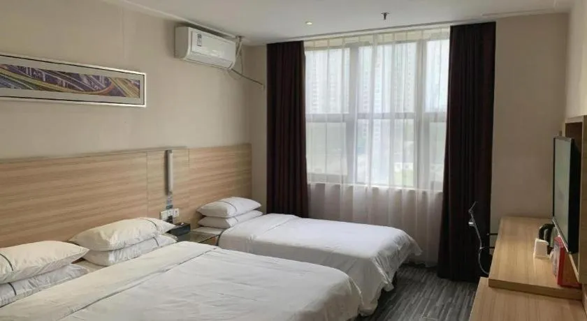 Bed in City Comfort Inn Yichang Dongshan Three Gorges University Shuiyuecheng