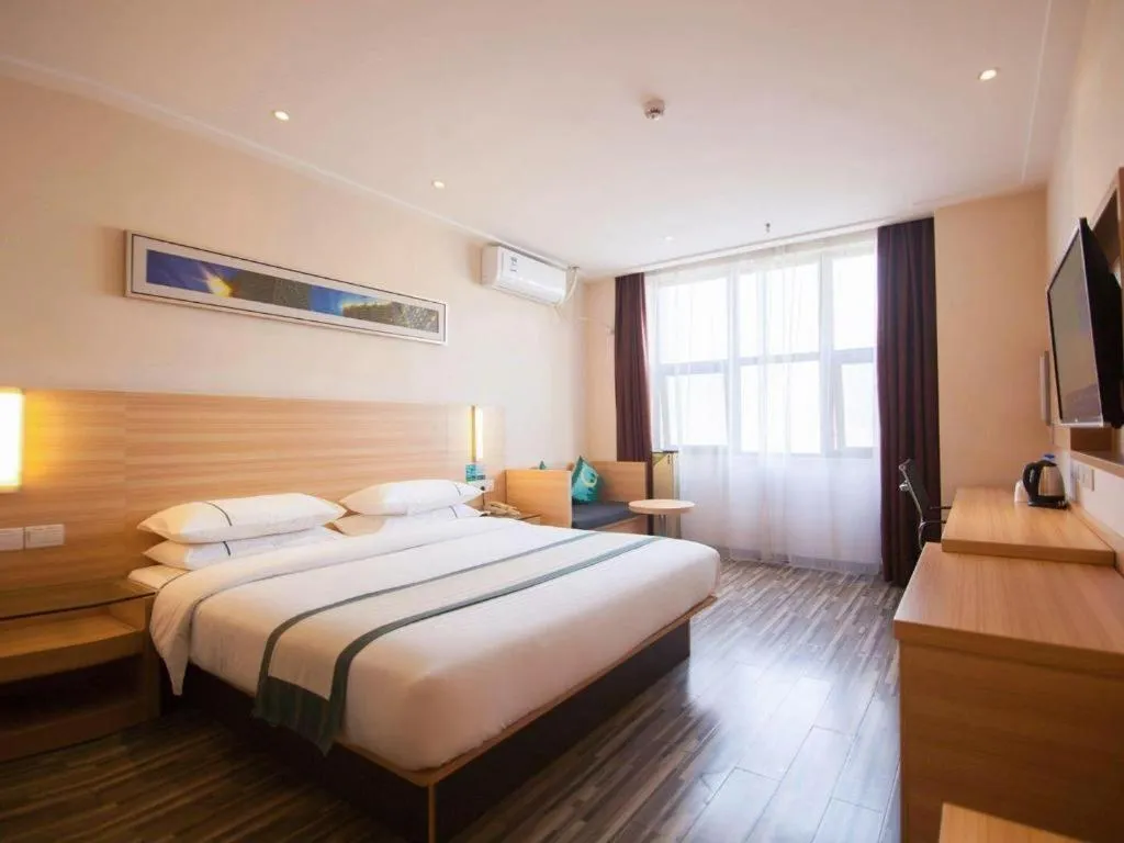 Bed in City Comfort Inn Yichang Dongshan Three Gorges University Shuiyuecheng