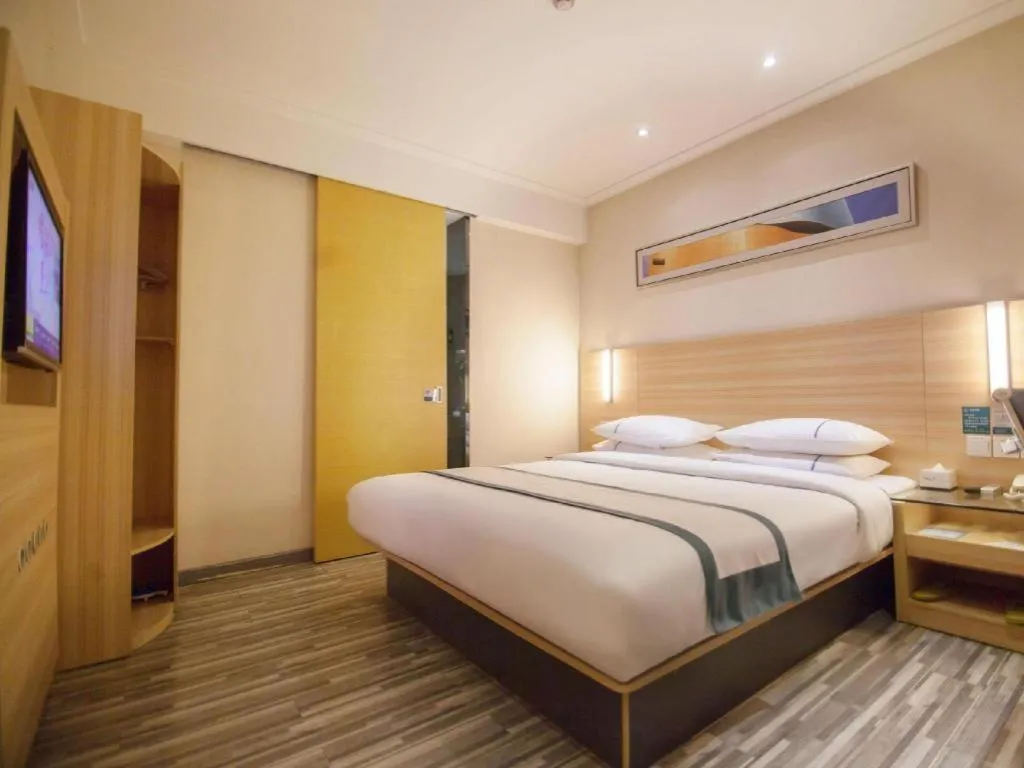 Bed in City Comfort Inn Yichang Dongshan Three Gorges University Shuiyuecheng