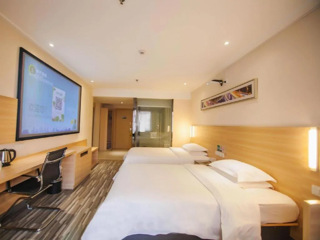 Bed in City Comfort Inn Yichang Dongshan Three Gorges University Shuiyuecheng