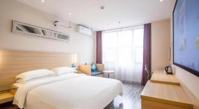 Bed in City Comfort Inn Yichang Dongshan Three Gorges University Shuiyuecheng