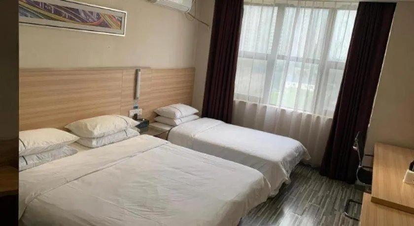 Bed in City Comfort Inn Yichang Dongshan Three Gorges University Shuiyuecheng