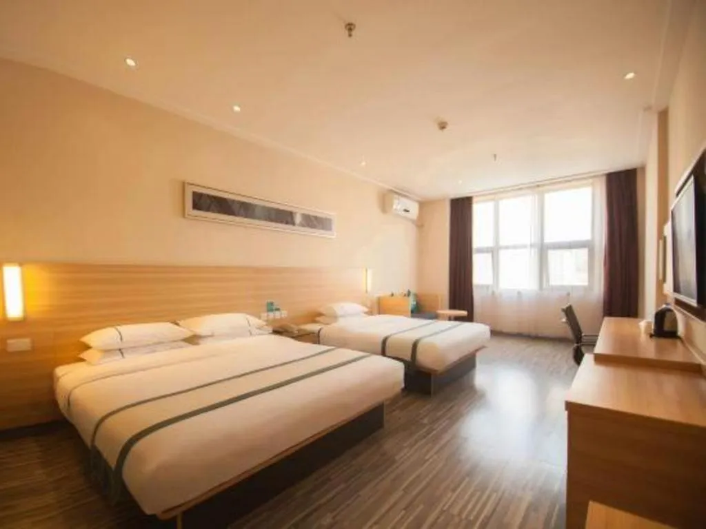 Bed in City Comfort Inn Yichang Dongshan Three Gorges University Shuiyuecheng