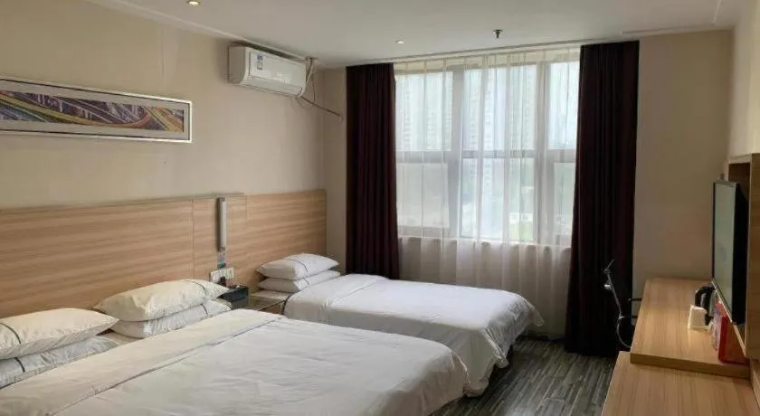 Bed in City Comfort Inn Yichang Dongshan Three Gorges University Shuiyuecheng