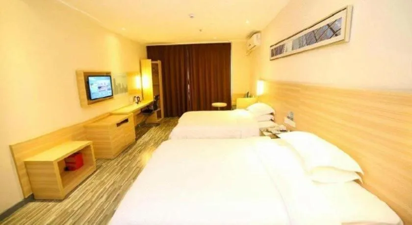 Bed in City Comfort Inn Yichang Dongshan Three Gorges University Shuiyuecheng