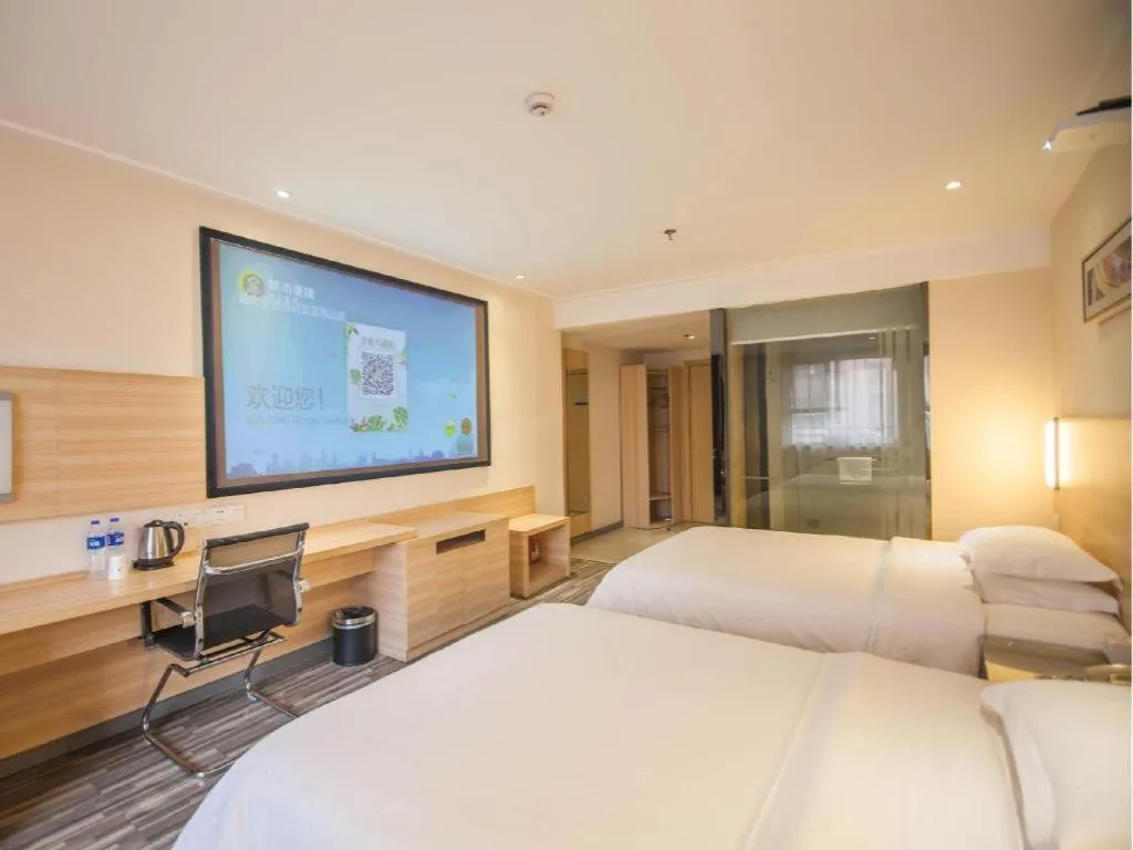 Bed in City Comfort Inn Yichang Dongshan Three Gorges University Shuiyuecheng