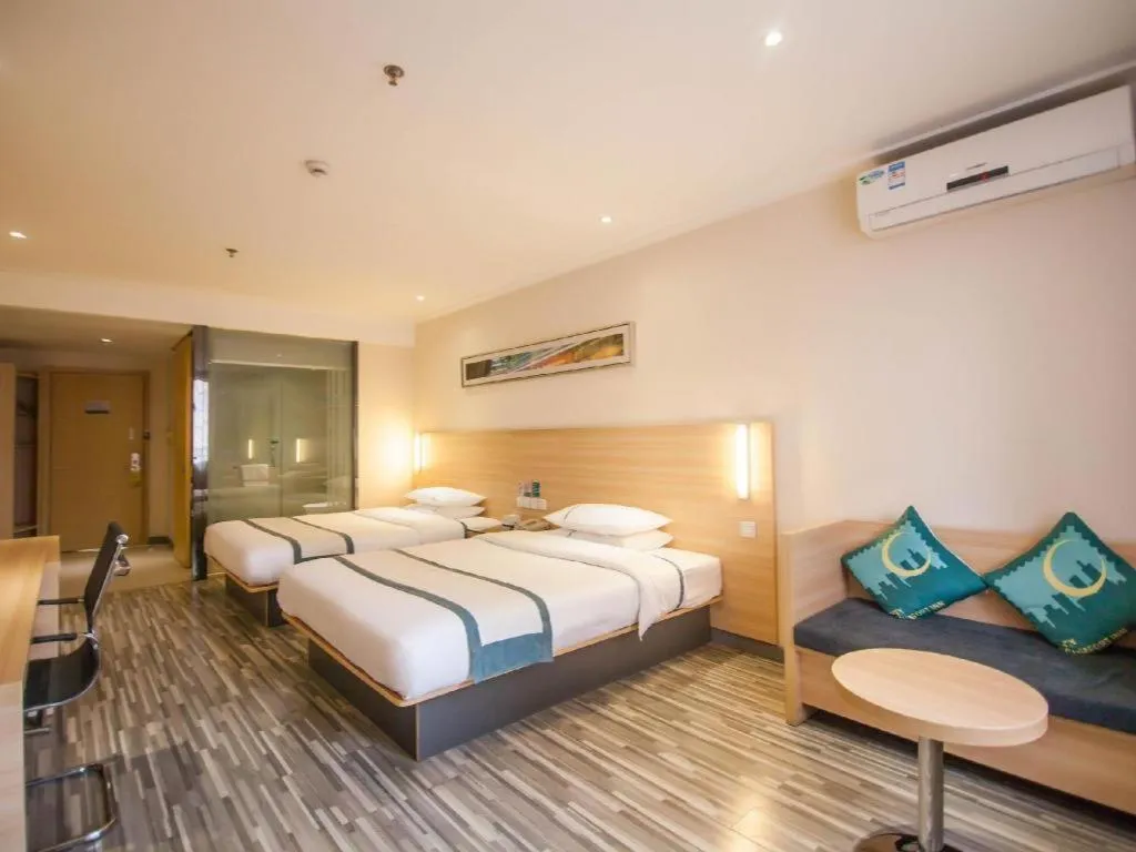 Bed in City Comfort Inn Yichang Dongshan Three Gorges University Shuiyuecheng