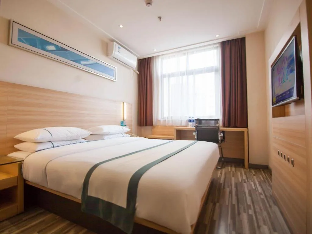 Bed in City Comfort Inn Yichang Dongshan Three Gorges University Shuiyuecheng