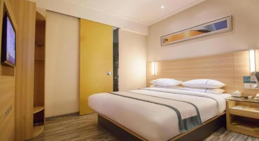 Bed in City Comfort Inn Yichang Dongshan Three Gorges University Shuiyuecheng