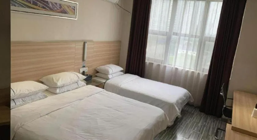 Bed in City Comfort Inn Yichang Dongshan Three Gorges University Shuiyuecheng