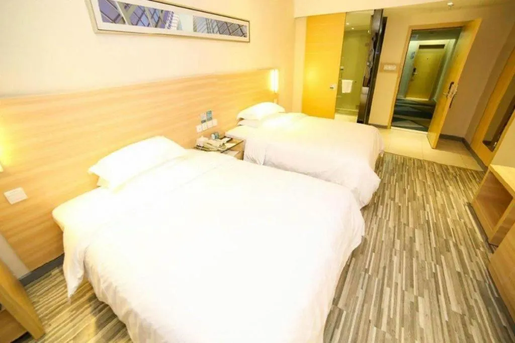 Bed in City Comfort Inn Yichang Dongshan Three Gorges University Shuiyuecheng