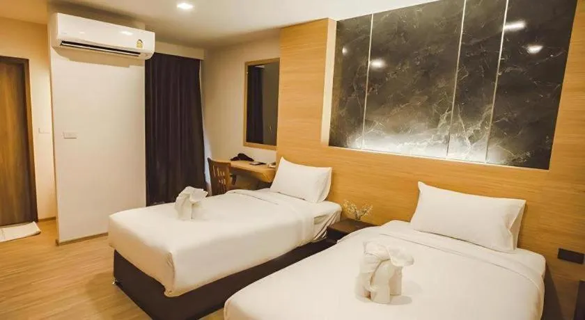 Bed in B2 Amata Nakorn Premier Hotel