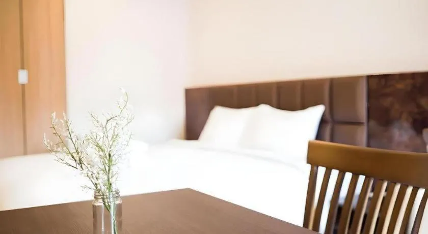 Bed in B2 Amata Nakorn Premier Hotel