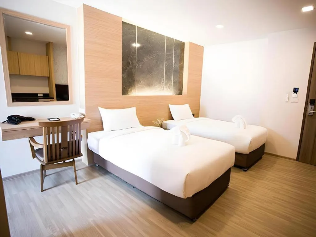 Bed in B2 Amata Nakorn Premier Hotel