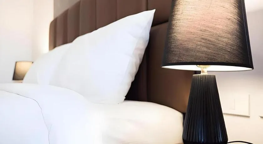 Bed in B2 Amata Nakorn Premier Hotel