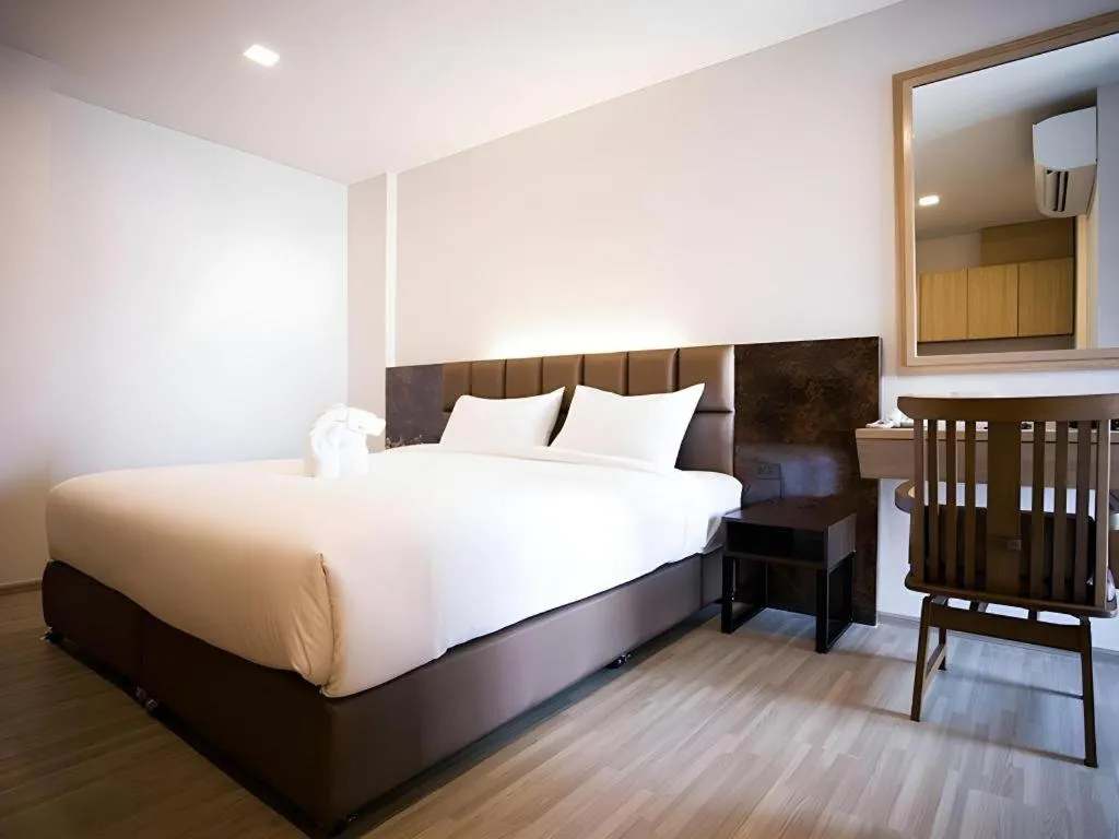 Bed in B2 Amata Nakorn Premier Hotel