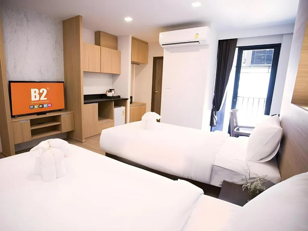 Bed in B2 Amata Nakorn Premier Hotel