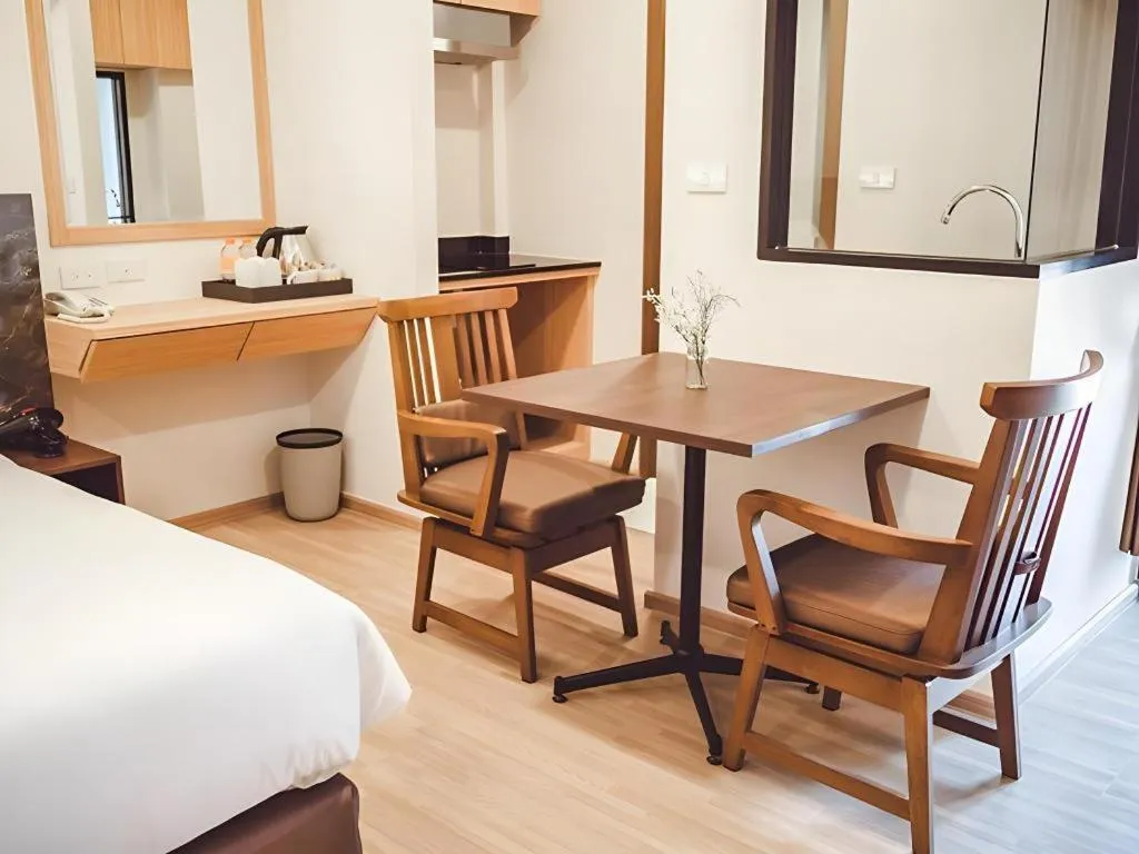 Bed in B2 Amata Nakorn Premier Hotel