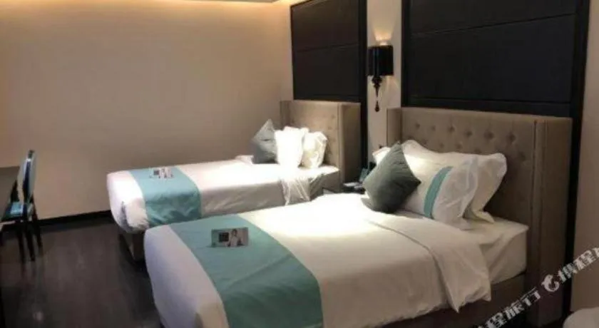 Bed in Xana Hotelle· Shijiazhuang Yaqing Street