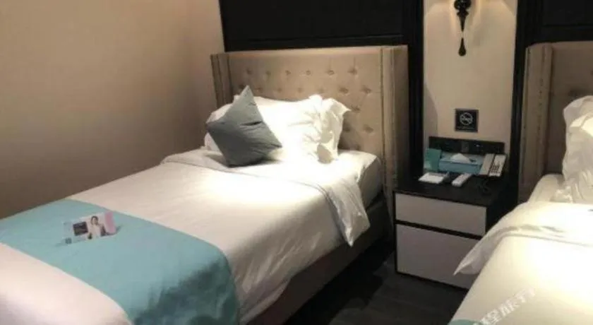 Bed in Xana Hotelle· Shijiazhuang Yaqing Street