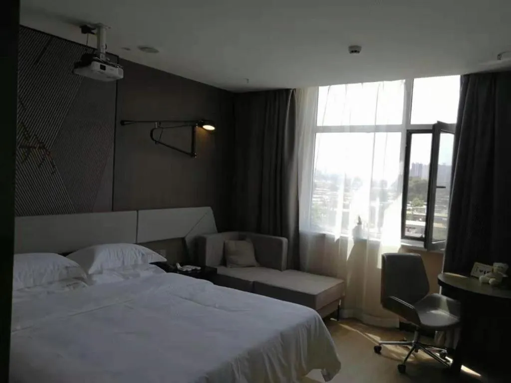 Bed in IU Hotels· Xincheng Haibing University Store