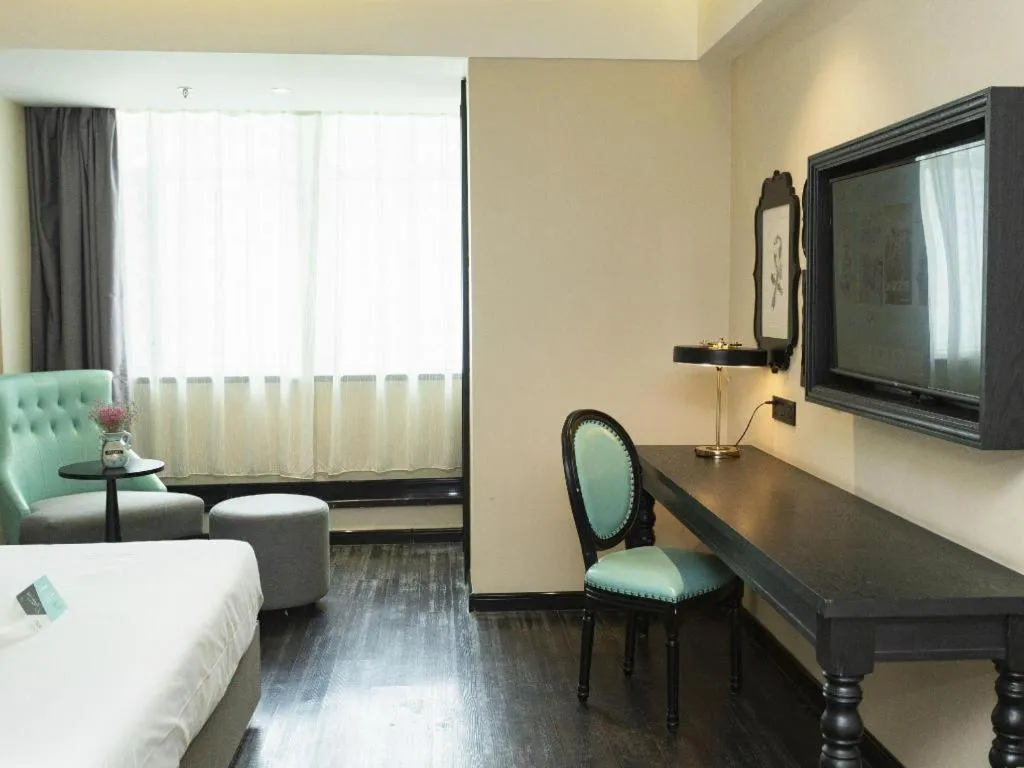 Bed in Xana Hotelle· Wulumuqi High Speed Railway Station Baonengcheng