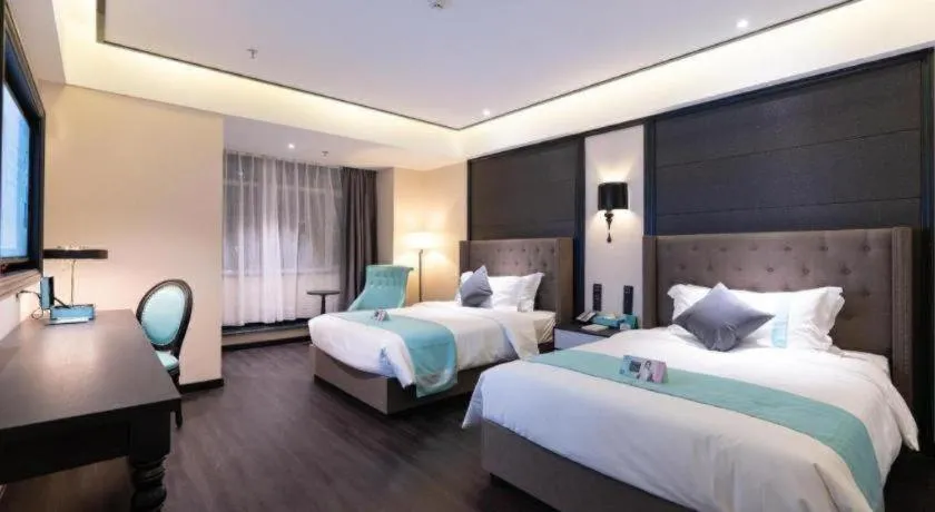 Bed in Xana Hotelle· Wulumuqi High Speed Railway Station Baonengcheng