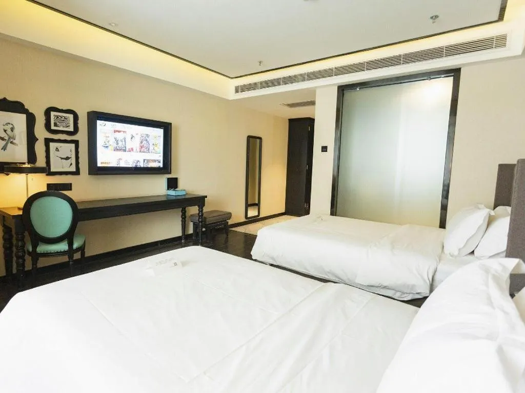 Bed in Xana Hotelle· Wulumuqi High Speed Railway Station Baonengcheng