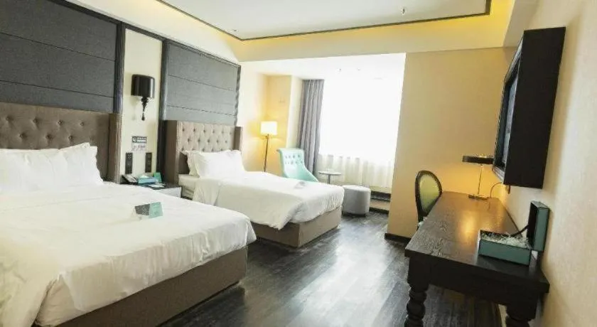 Bed in Xana Hotelle· Wulumuqi High Speed Railway Station Baonengcheng