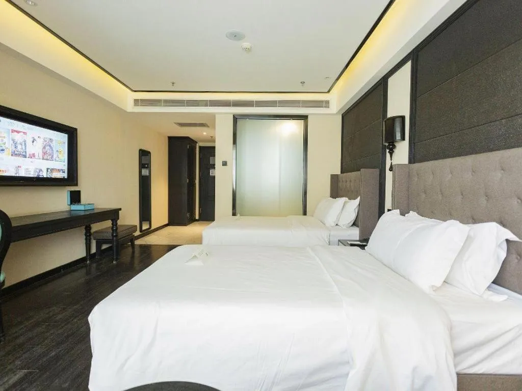 Bed in Xana Hotelle· Wulumuqi High Speed Railway Station Baonengcheng