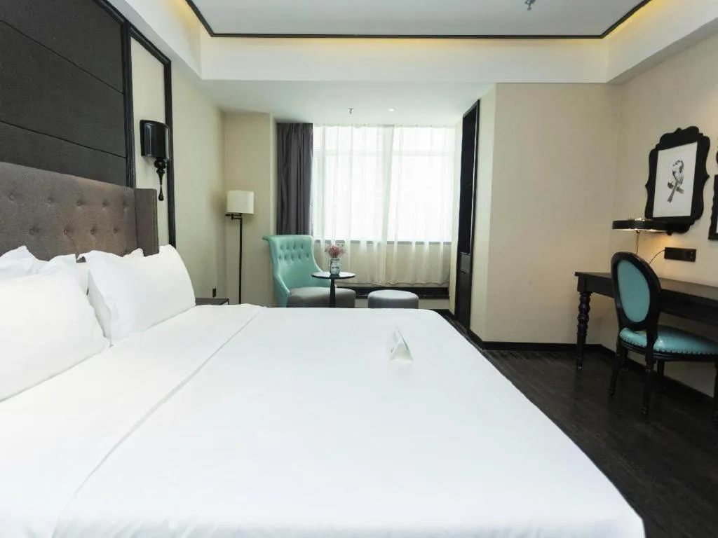 Bed in Xana Hotelle· Wulumuqi High Speed Railway Station Baonengcheng