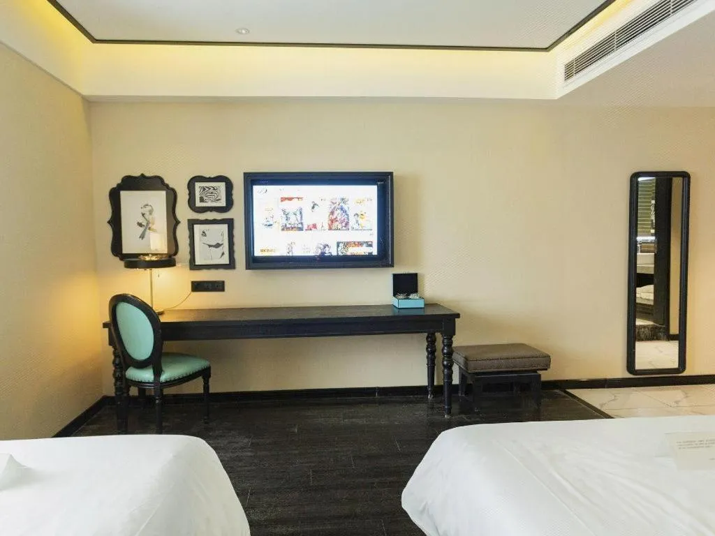 Bed in Xana Hotelle· Wulumuqi High Speed Railway Station Baonengcheng