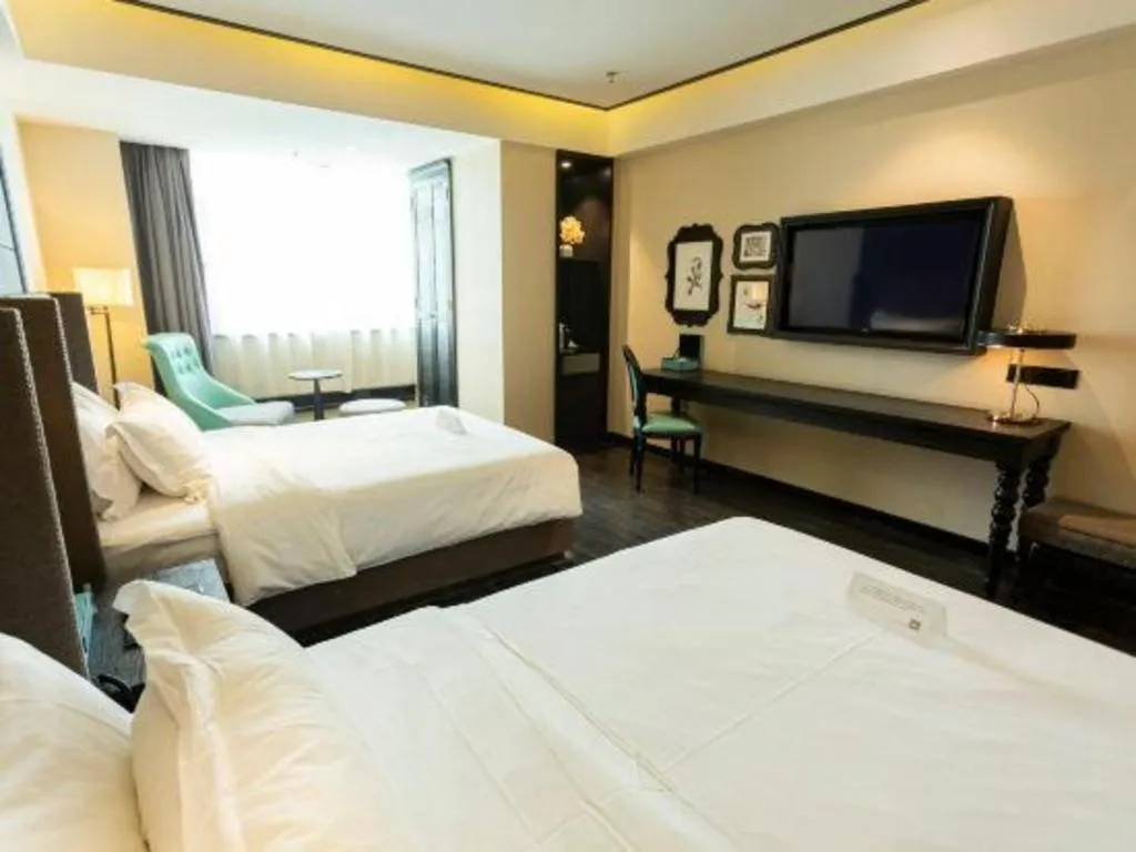 Bed in Xana Hotelle· Wulumuqi High Speed Railway Station Baonengcheng