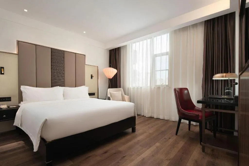 Bed in Jinjiang Metropolo Haikou East High Speed Railway Station Normal University