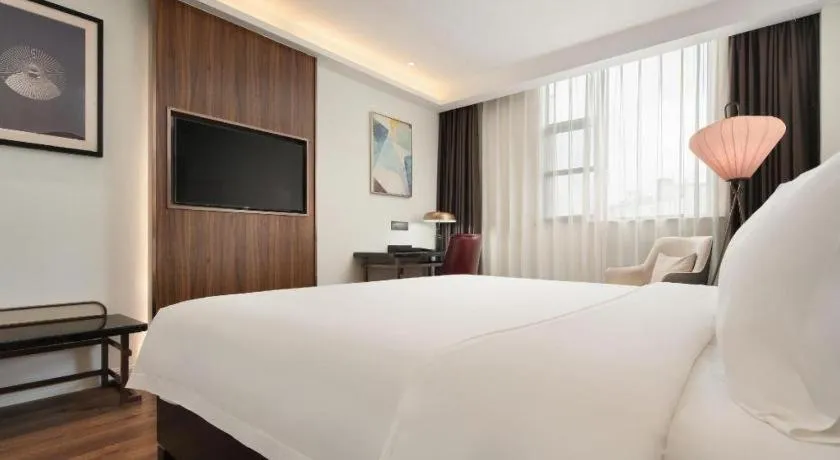 Bed in Jinjiang Metropolo Haikou East High Speed Railway Station Normal University