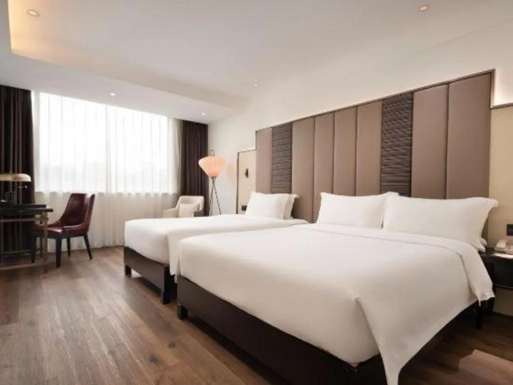 Bed in Jinjiang Metropolo Haikou East High Speed Railway Station Normal University