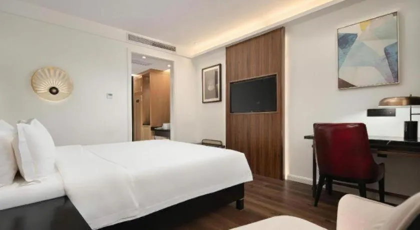 Bed in Jinjiang Metropolo Haikou East High Speed Railway Station Normal University