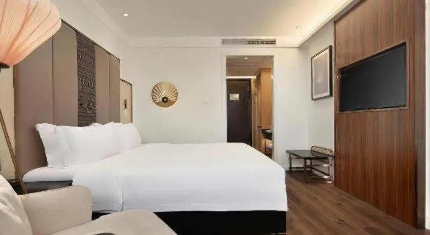 Bed in Jinjiang Metropolo Haikou East High Speed Railway Station Normal University