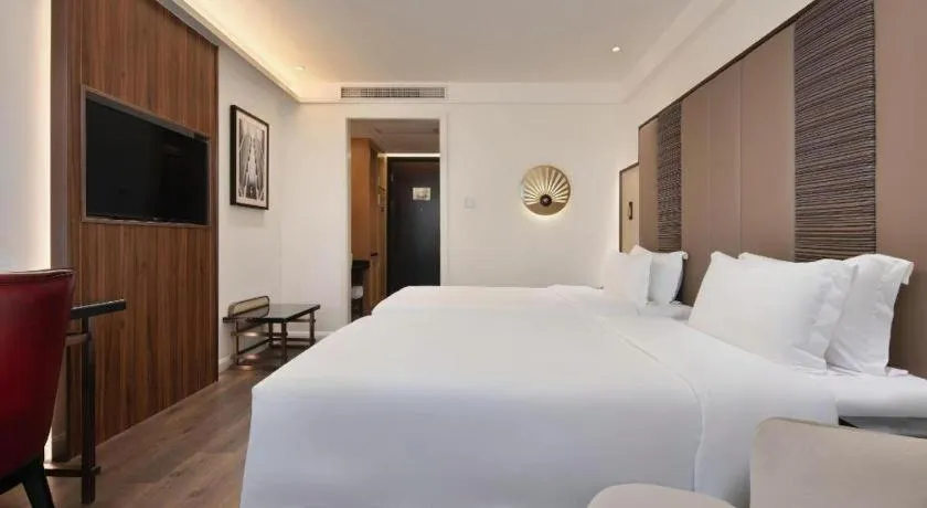 Bed in Jinjiang Metropolo Haikou East High Speed Railway Station Normal University