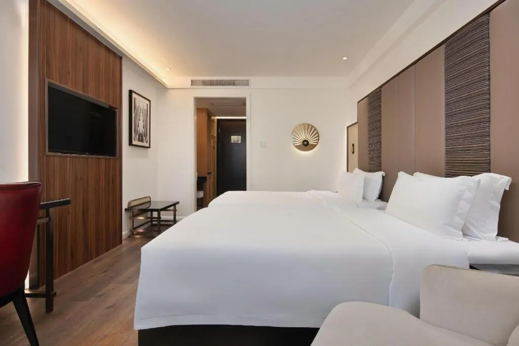 Bed in Jinjiang Metropolo Haikou East High Speed Railway Station Normal University